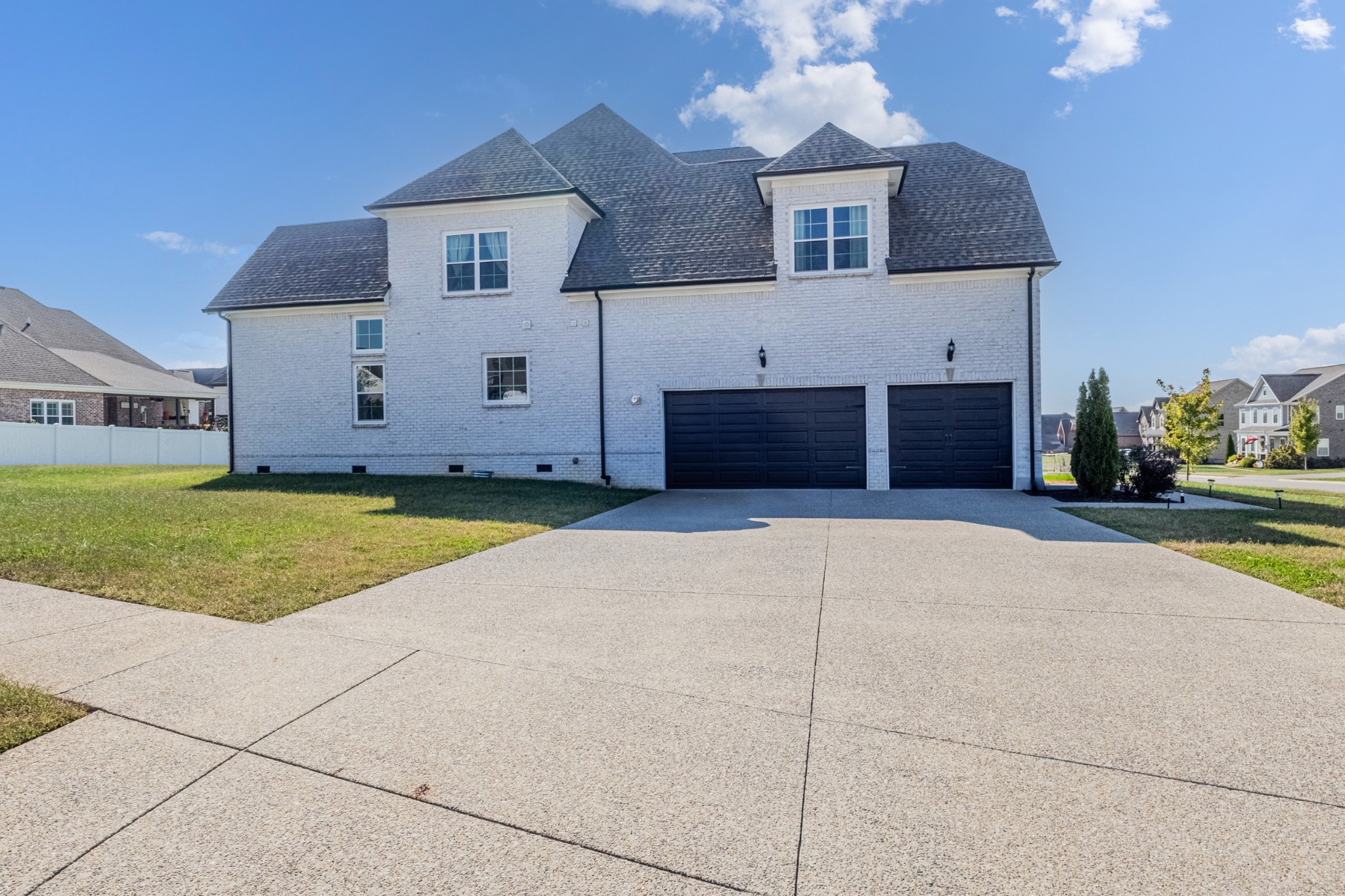 9017 Safehaven Place Spring Hill, TN 37174 - Photo 49 of 50 a house view with a garden space