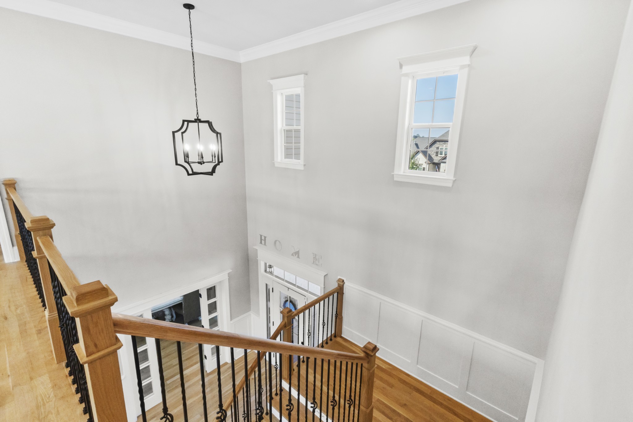 9017 Safehaven Place Spring Hill, TN 37174 - Photo 5 of 50 a view of wooden floor and chandelier in a room