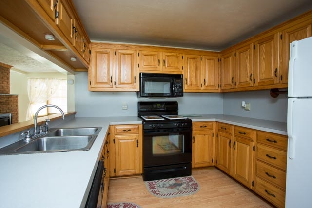 604 North River Road Mount Solon, VA 22843 - Photo 4 of 30 a kitchen with stainless steel appliances granite countertop a sink stove and microwave