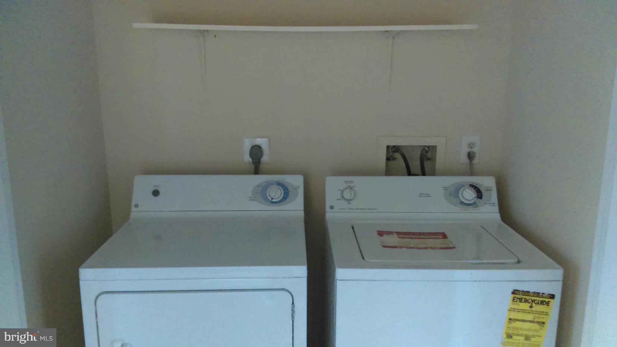 11117 Light Guard Loop Manassas, VA 20109 - Photo 21 of 25 a utility room with dryer and washer