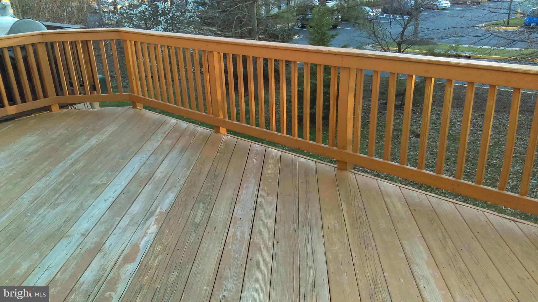11117 Light Guard Loop Manassas, VA 20109 - Photo 23 of 25 a view of outdoor space with wooden deck