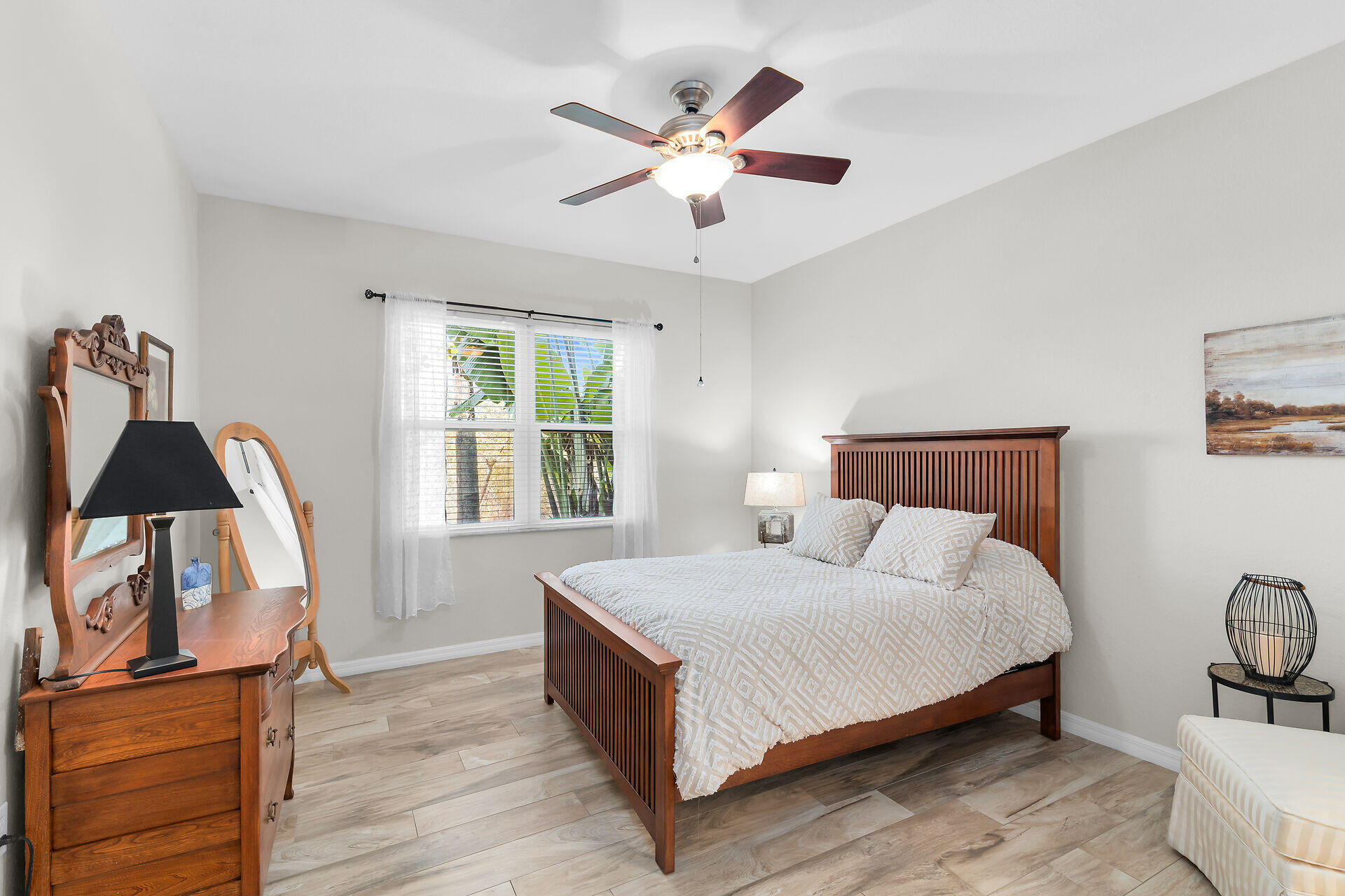 4685 Hawks Nest Way, Unit 101 Naples, FL 34114 - Photo 11 of 42 a bedroom with a bed and window