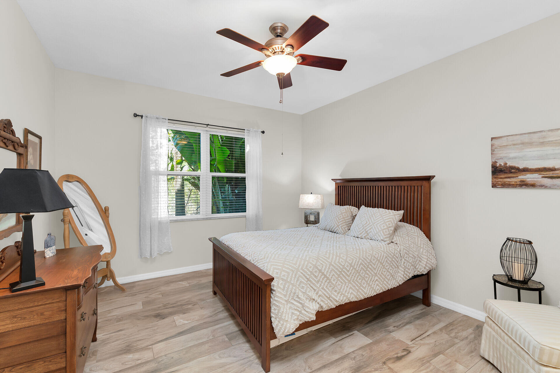 4685 Hawks Nest Way, Unit 101 Naples, FL 34114 - Photo 15 of 43 a bedroom with a bed and window