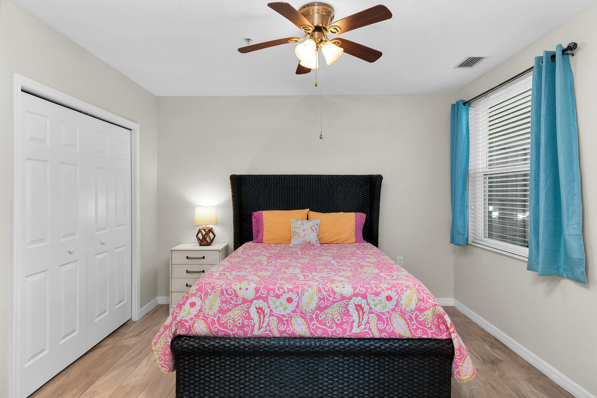 4685 Hawks Nest Way, Unit 101 Naples, FL 34114 - Photo 18 of 43 a bedroom with a bed and a window