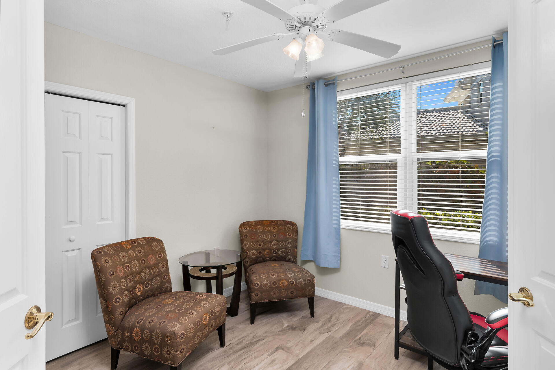 4685 Hawks Nest Way, Unit 101 Naples, FL 34114 - Photo 20 of 43 a living room with furniture and a window