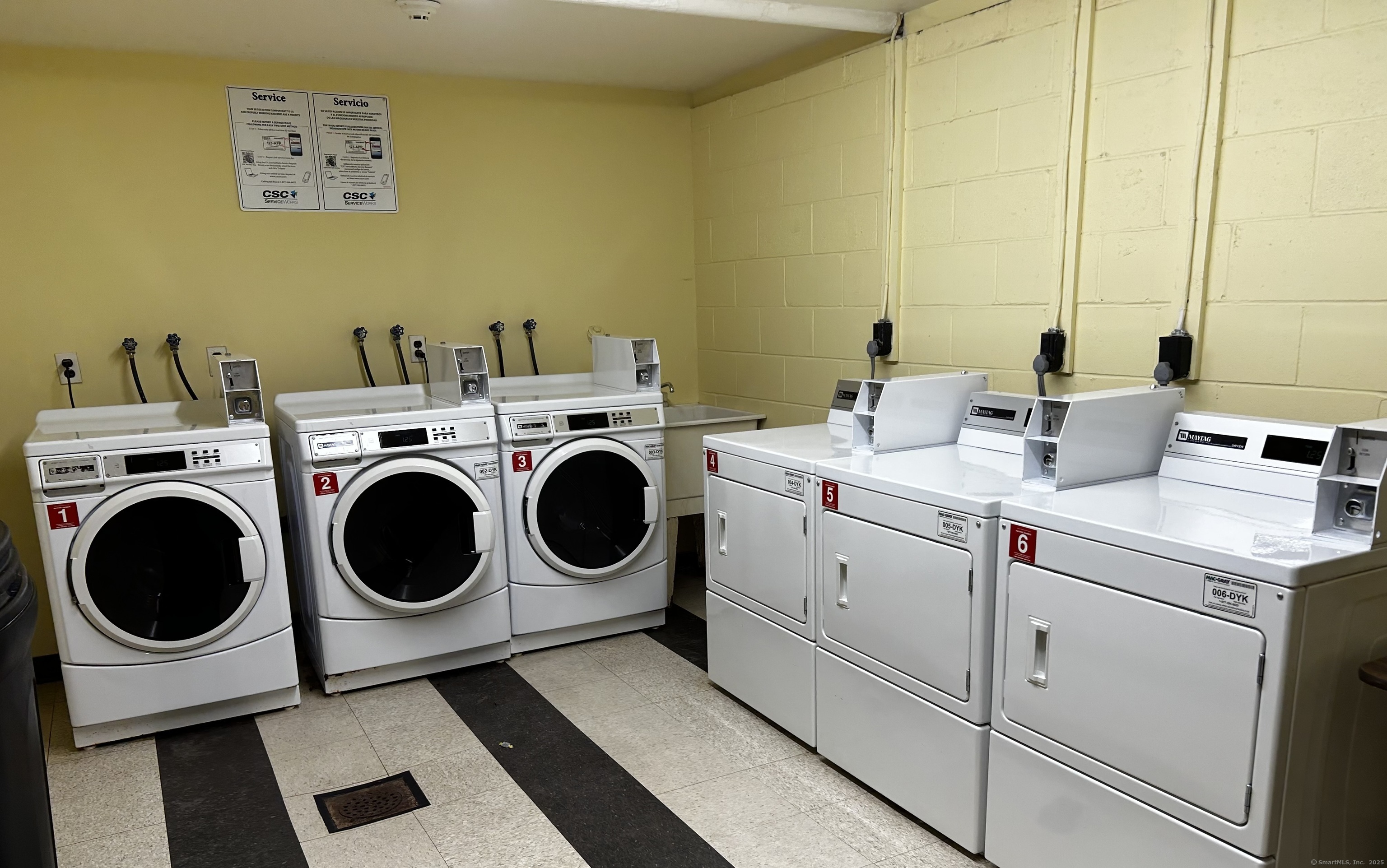 84 Wilton Crest Road, Unit 84 Wilton, CT 06897 - Photo 8 of 16 a utility room with dryer and washer