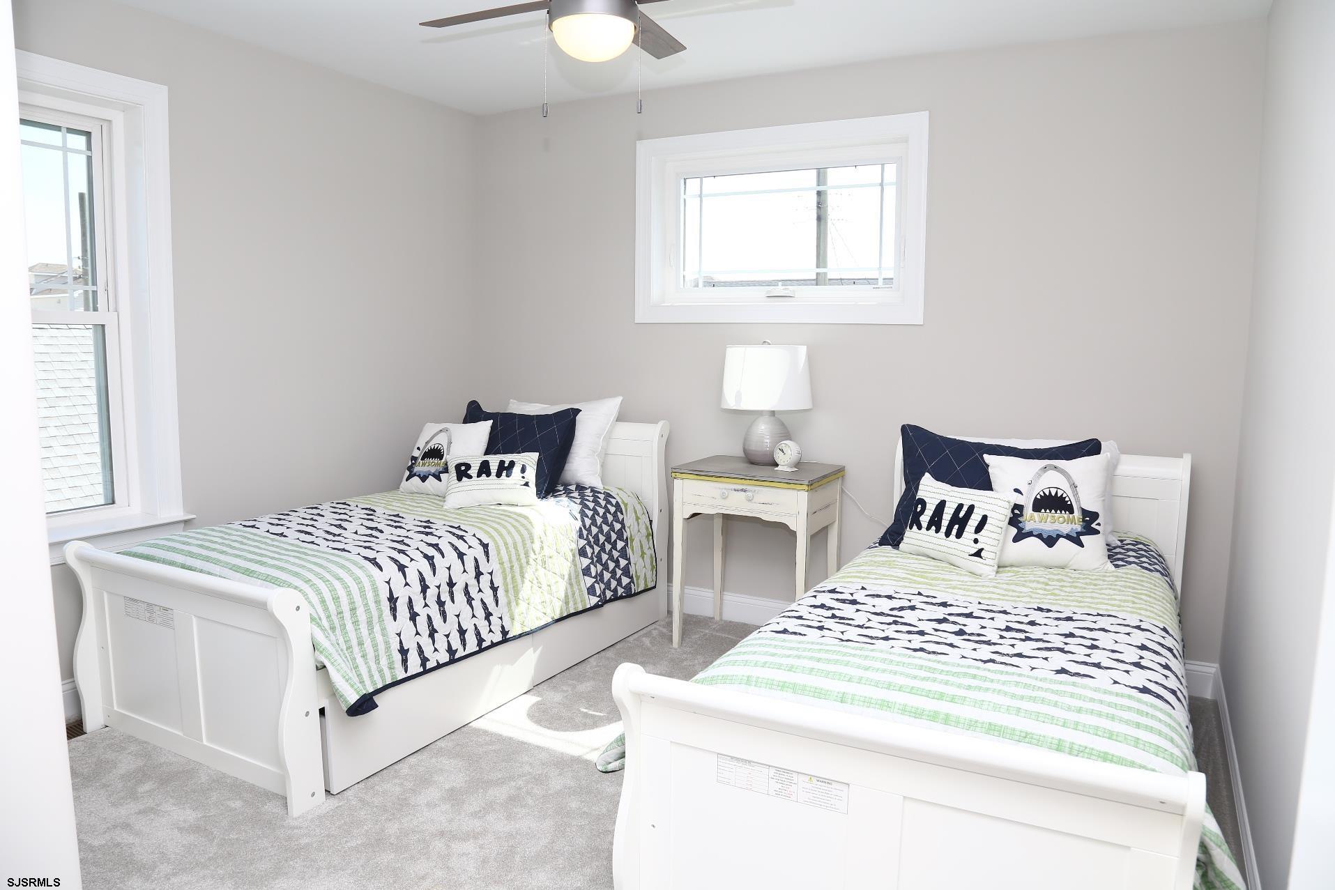 336 32nd Street South Brigantine, NJ 08203 - Photo 16 of 25 a bedroom with a bed and a window