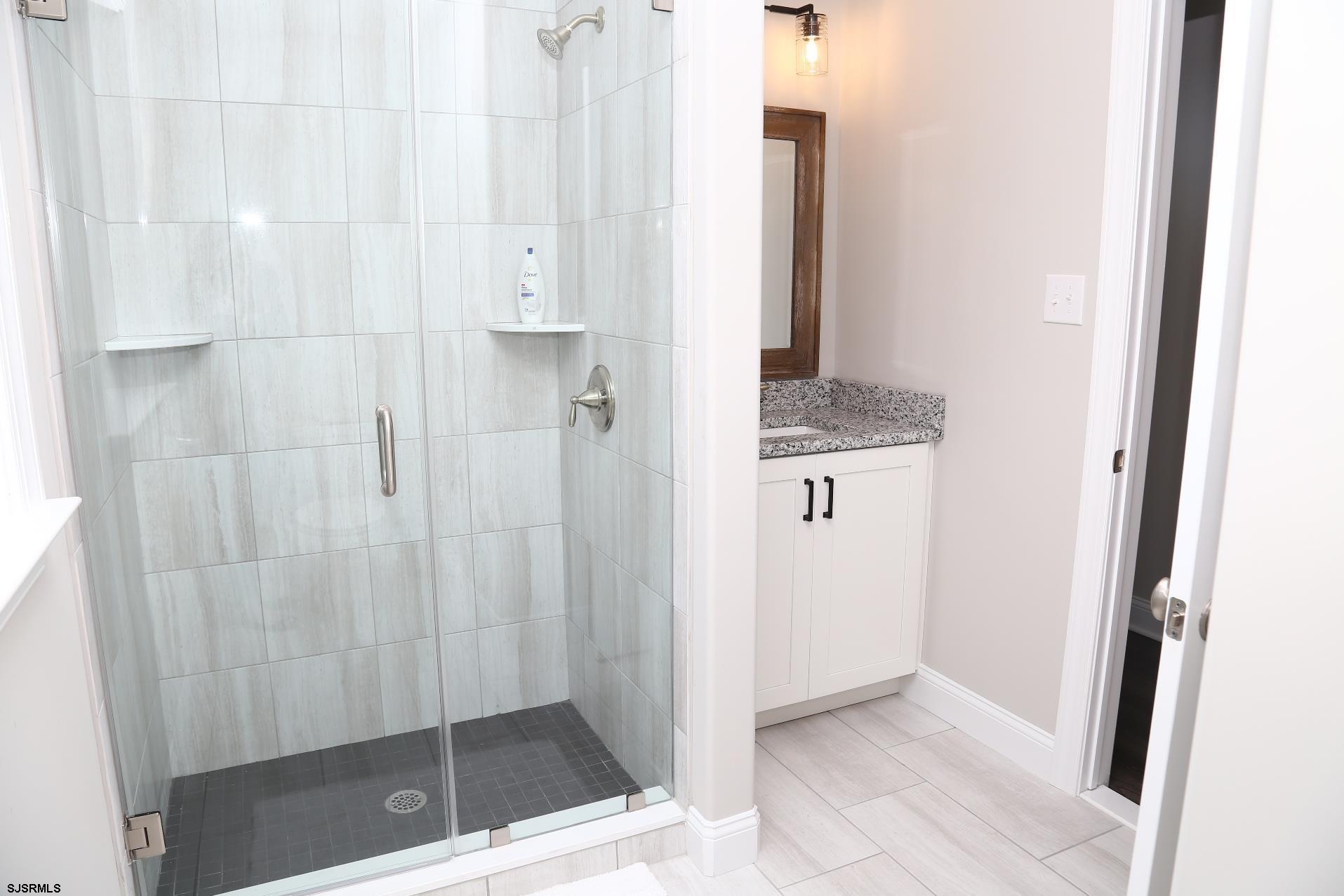 336 32nd Street South Brigantine, NJ 08203 - Photo 19 of 25 a bathroom with a shower