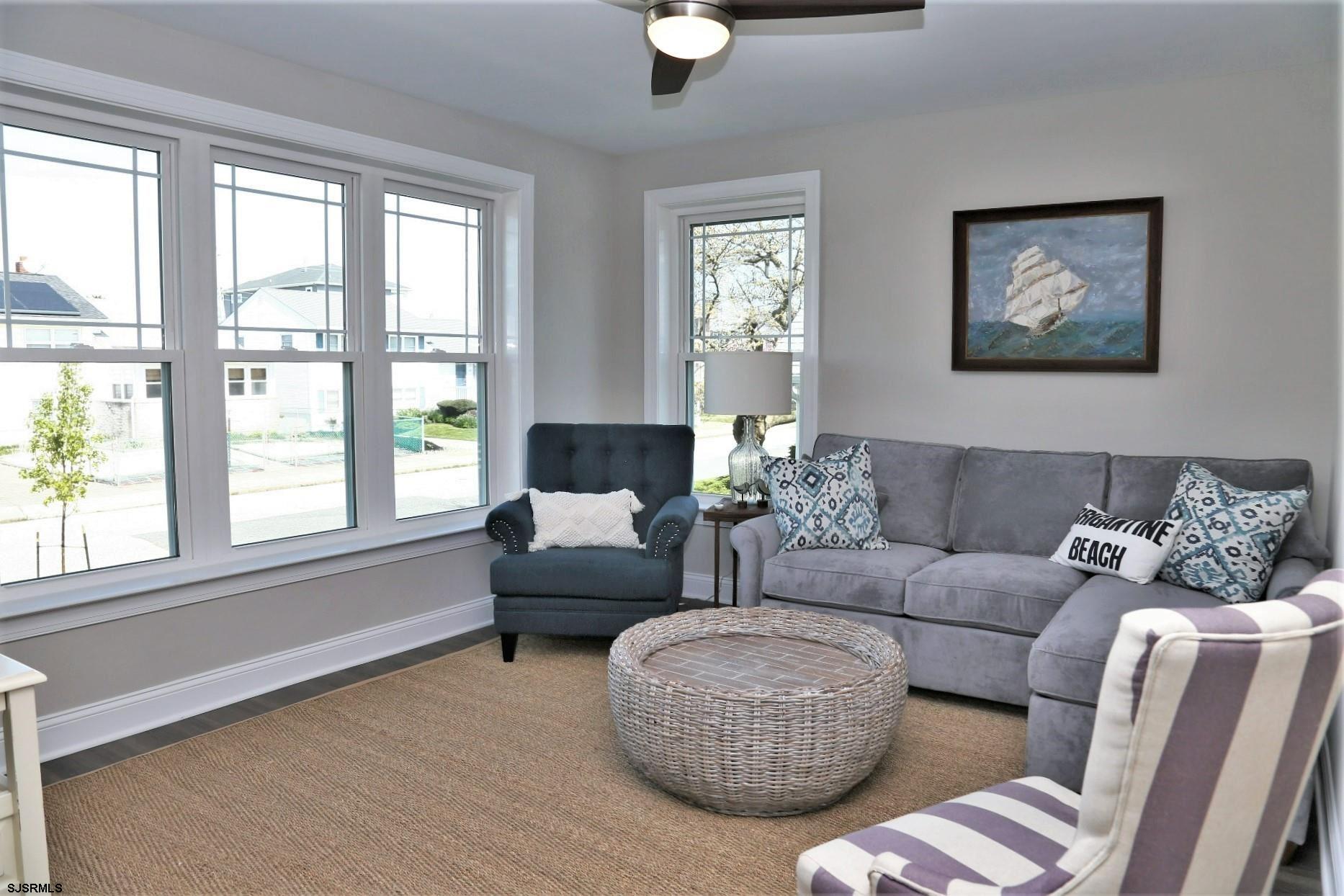336 32nd Street South Brigantine, NJ 08203 - Photo 25 of 25 a living room with furniture and a large window