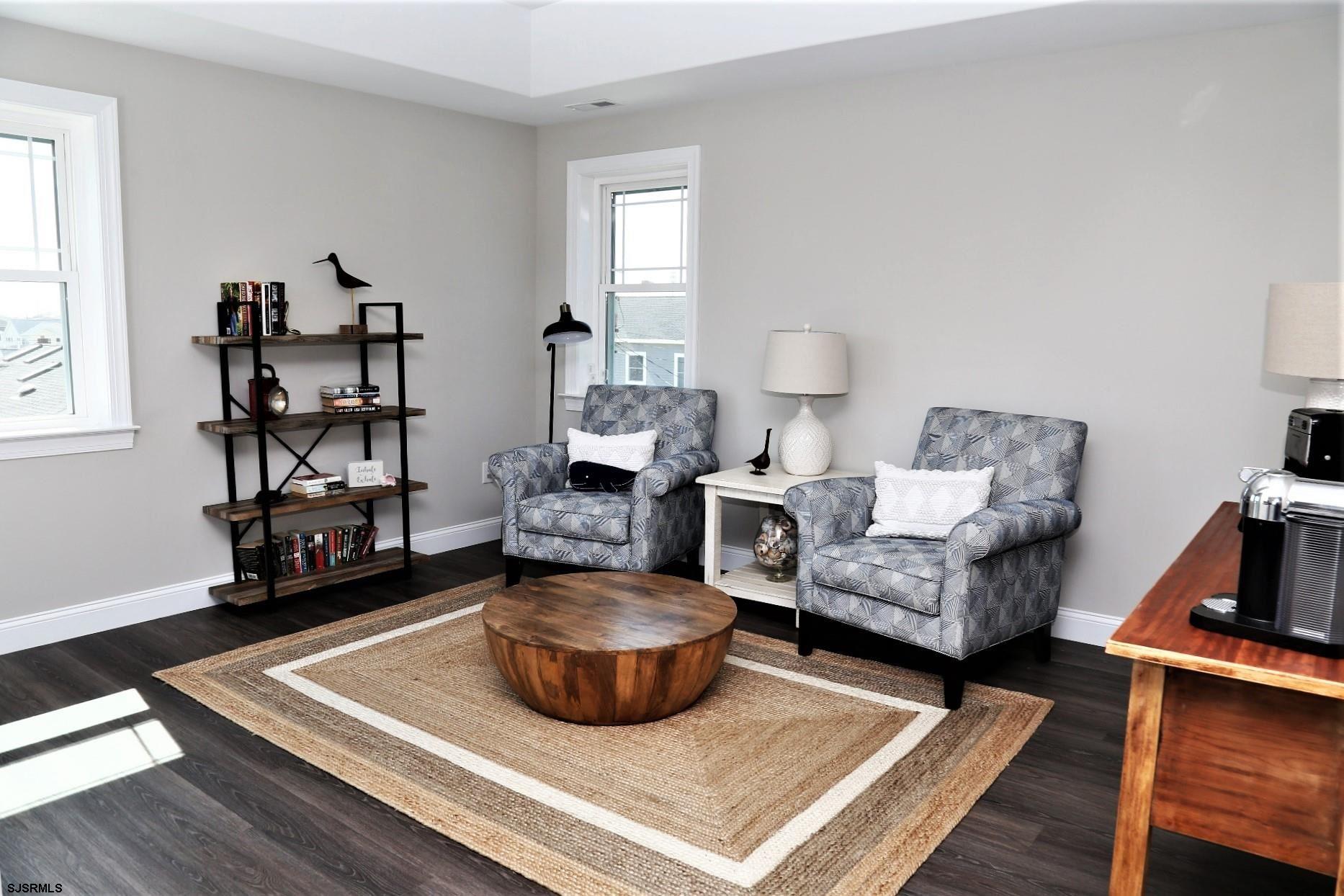 336 32nd Street South Brigantine, NJ 08203 - Photo 3 of 25 a living room with furniture and a wooden floor