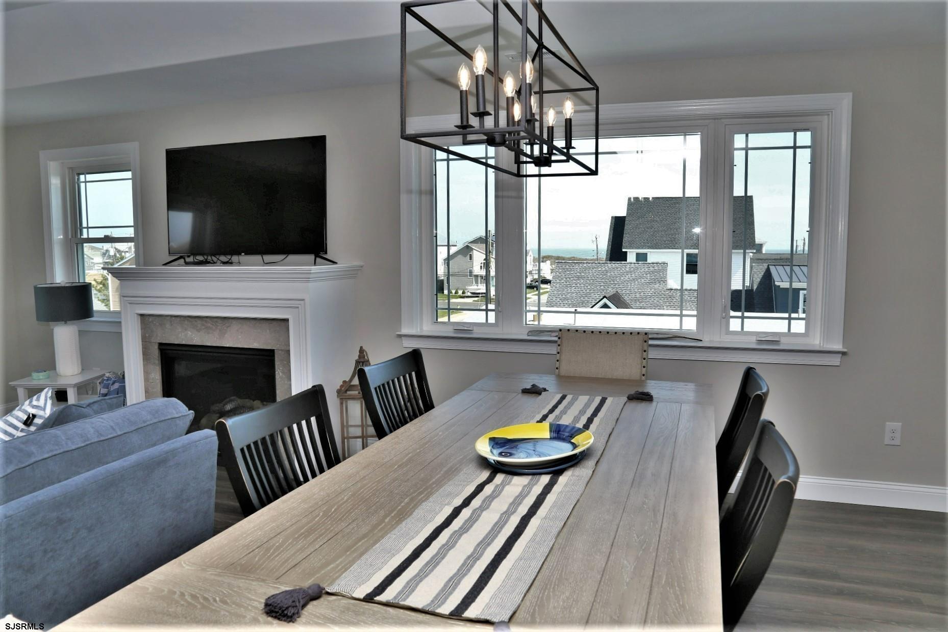 336 32nd Street South Brigantine, NJ 08203 - Photo 7 of 25 a living room with furniture fireplace and flat screen tv