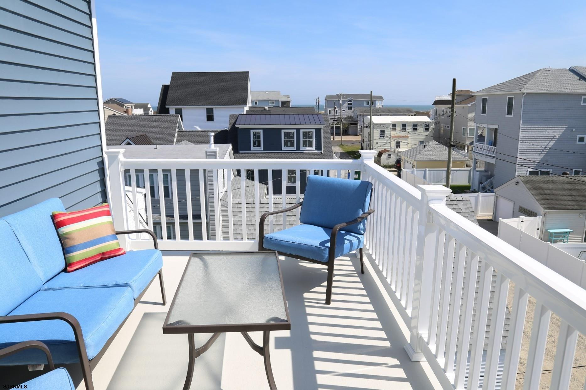 336 32nd Street South Brigantine, NJ 08203 - Photo 9 of 25 a view of a balcony with furniture