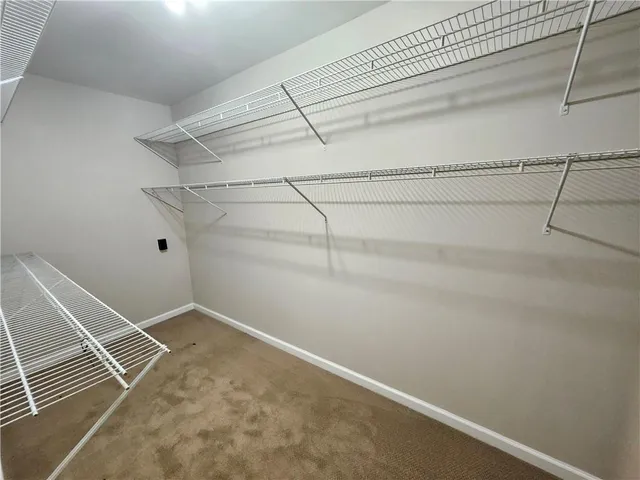a view of a room with racks on the wall