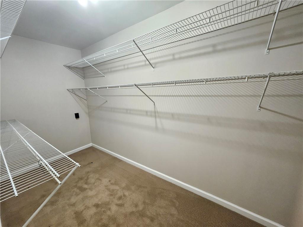 144 Hunters Trace Dallas, GA 30157 - Photo 19 of 34 a view of a room with racks on the wall