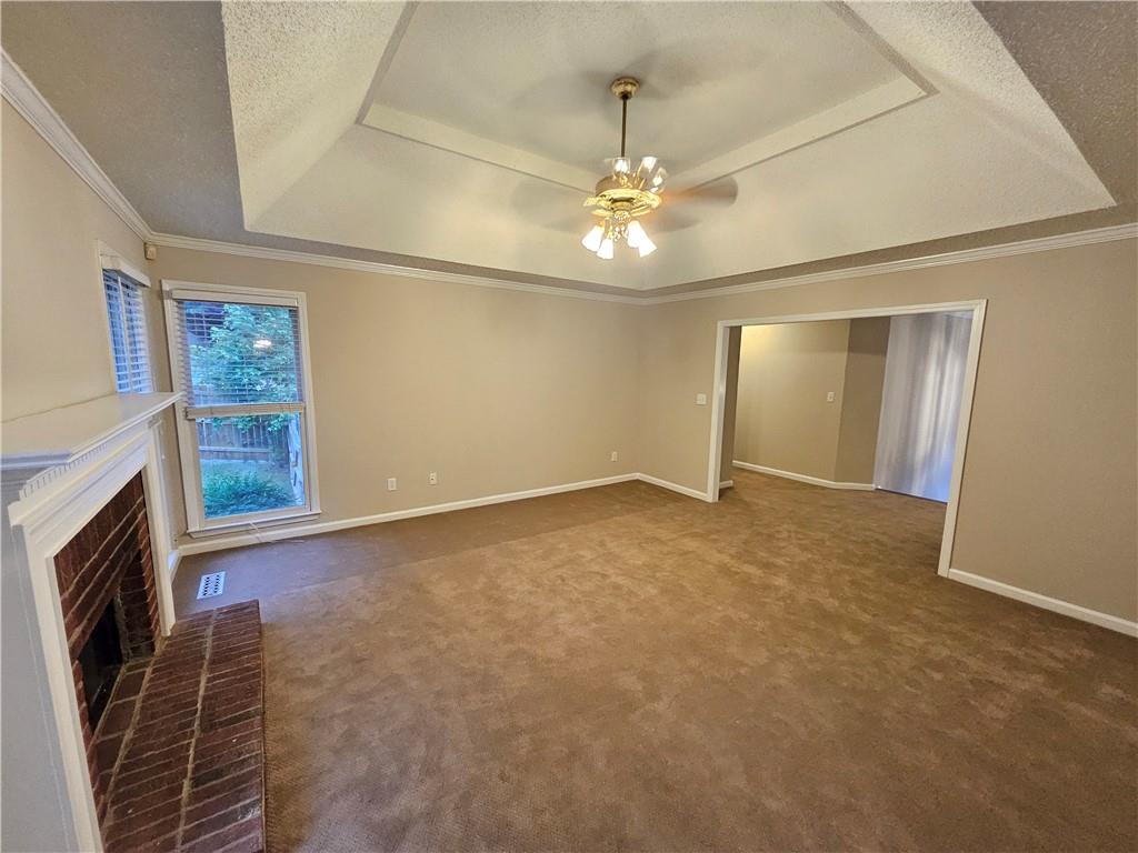144 Hunters Trace Dallas, GA 30157 - Photo 6 of 34 a view of an empty room with a fireplace