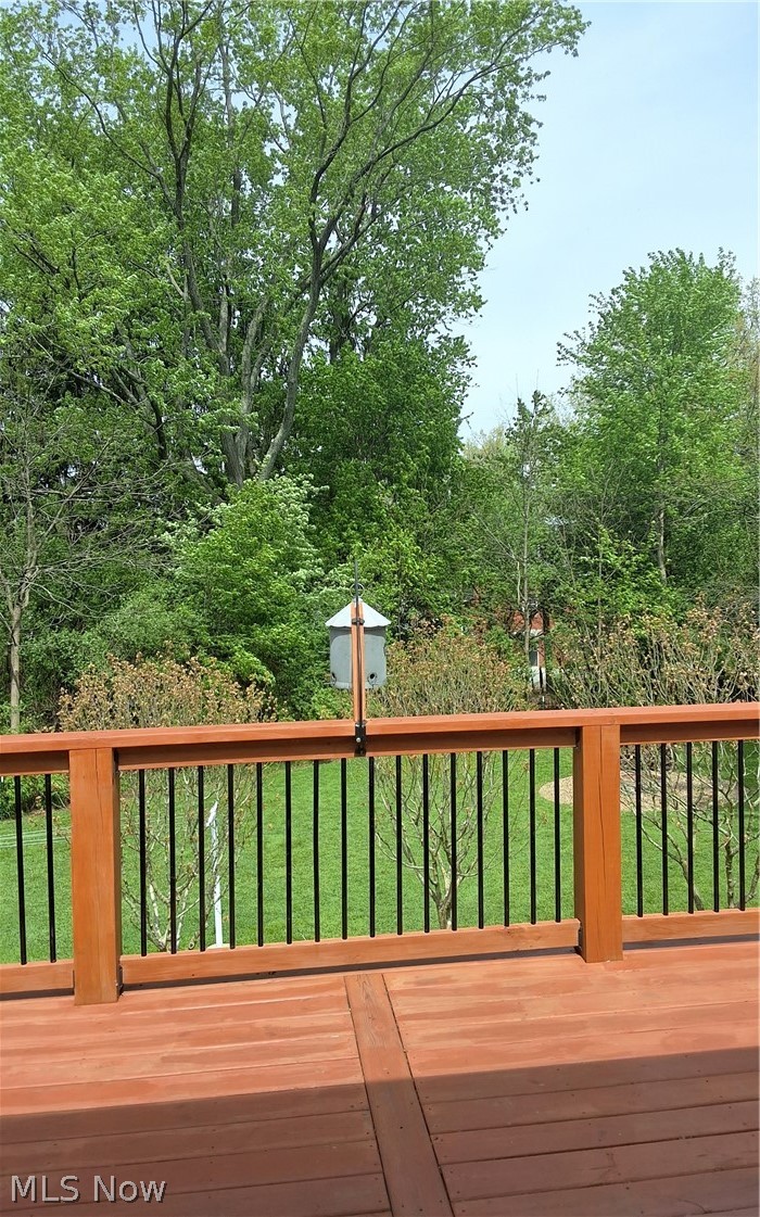 236 Bowland Road Mansfield, OH 44907 - Photo 24 of 34 Expansive outdoor deck featuring wood-finish flooring and a matching wood-finish railing with black metal balusters