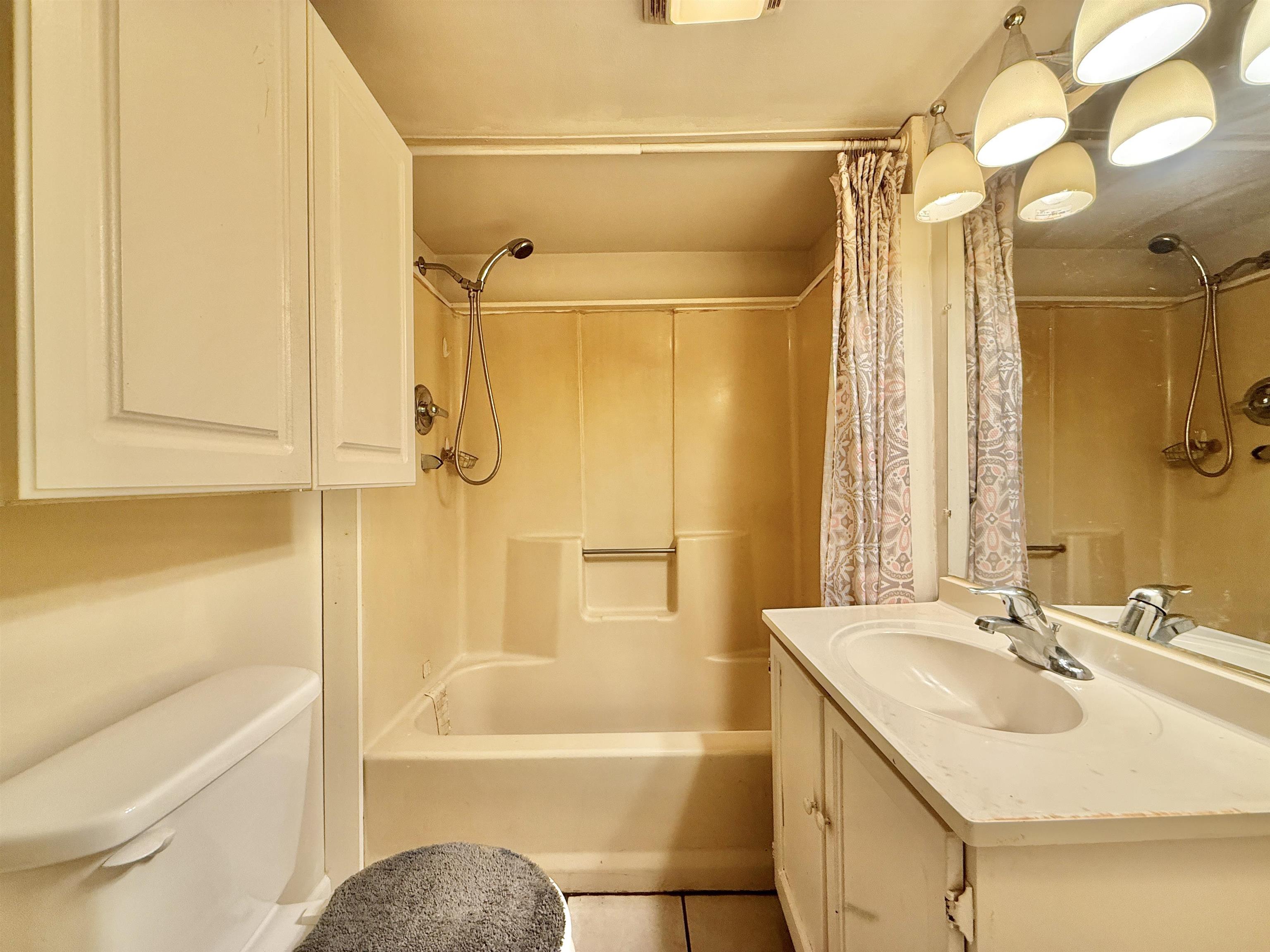 104 Head Of River Road Corbin City, NJ 08270 - Photo 28 of 50 a bathroom with a sink toilet and shower
