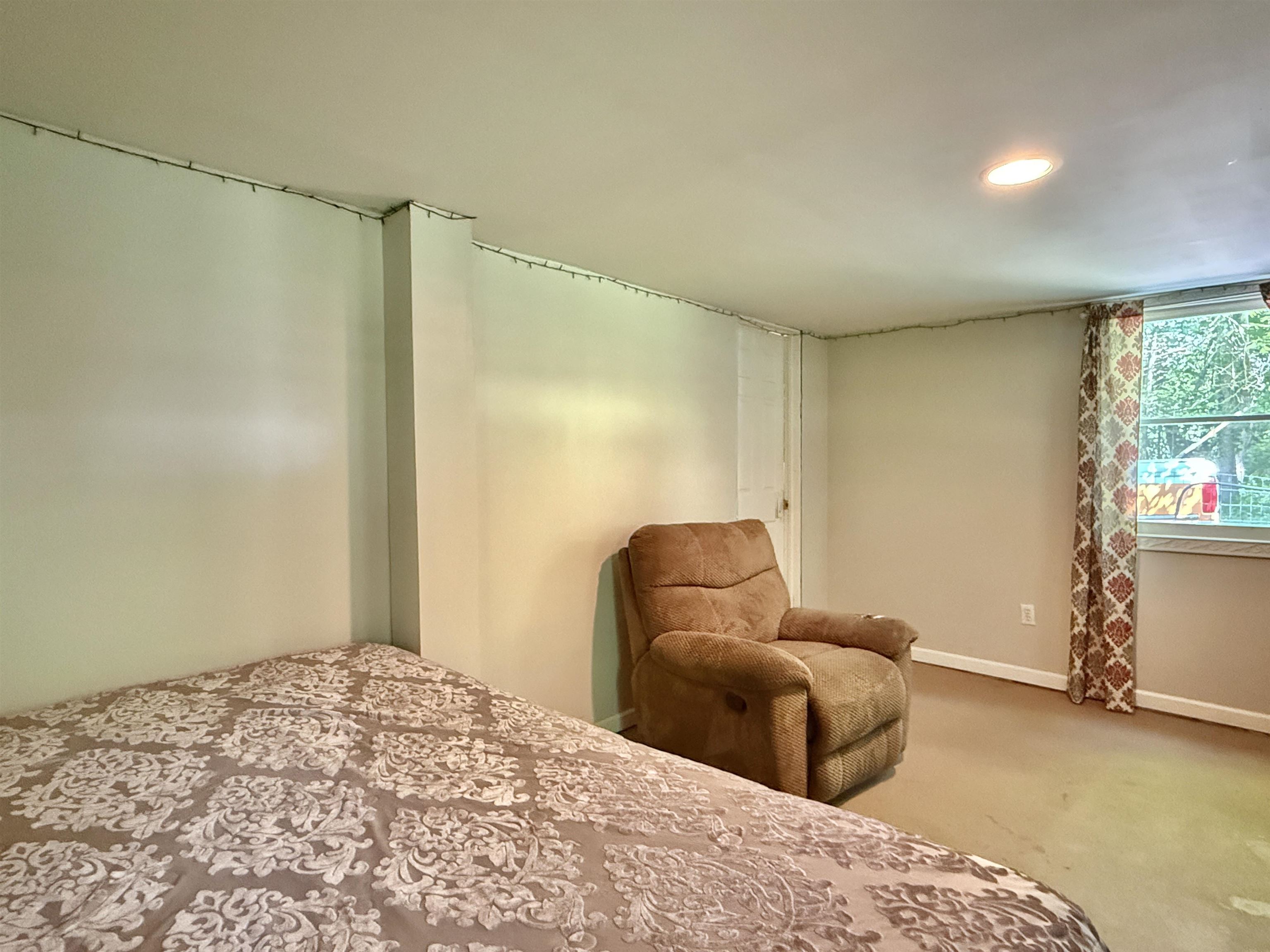 104 Head Of River Road Corbin City, NJ 08270 - Photo 29 of 50 a bedroom with a bed and furniture