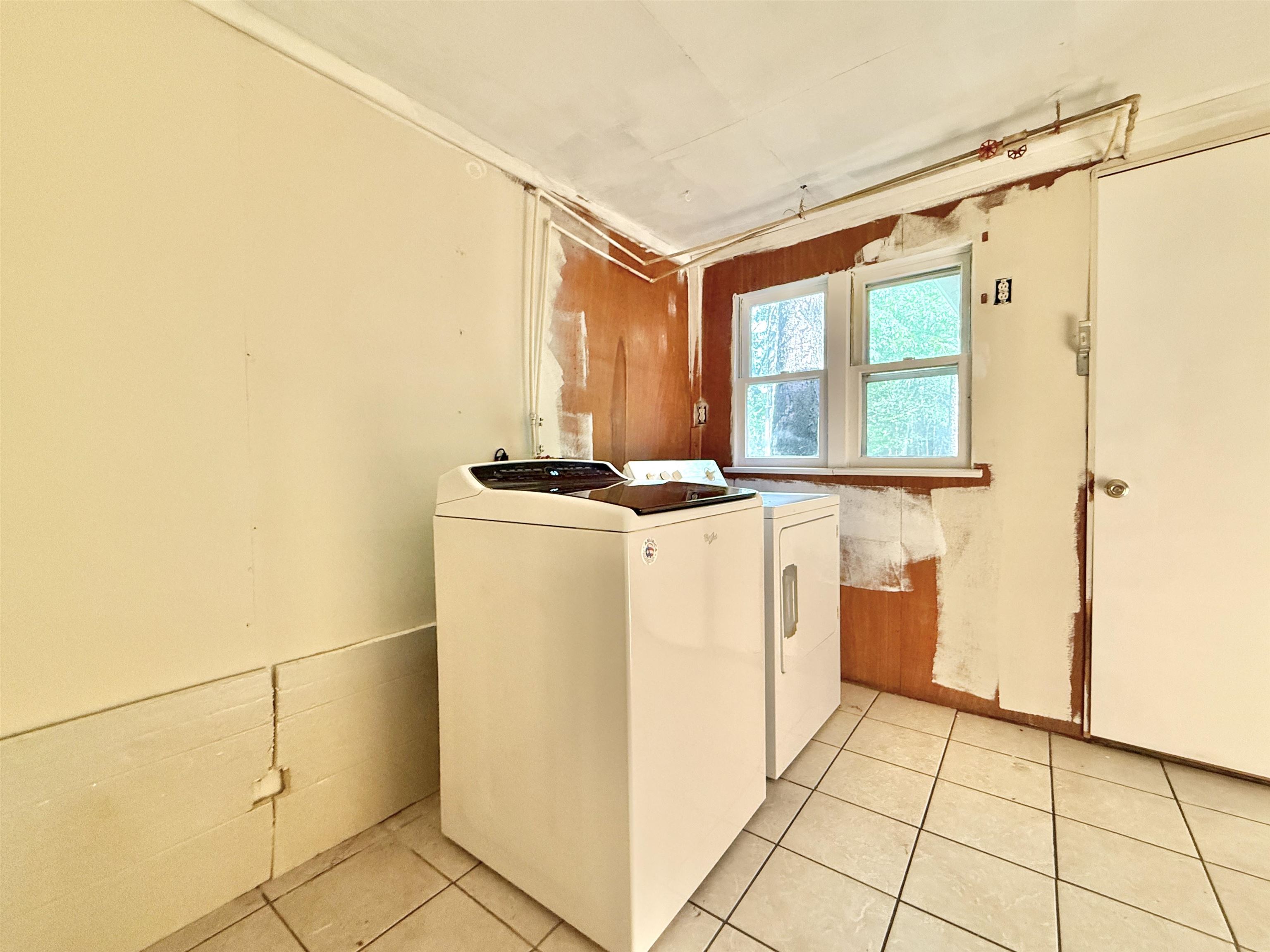 104 Head Of River Road Corbin City, NJ 08270 - Photo 34 of 50 a utility room with dryer and washer