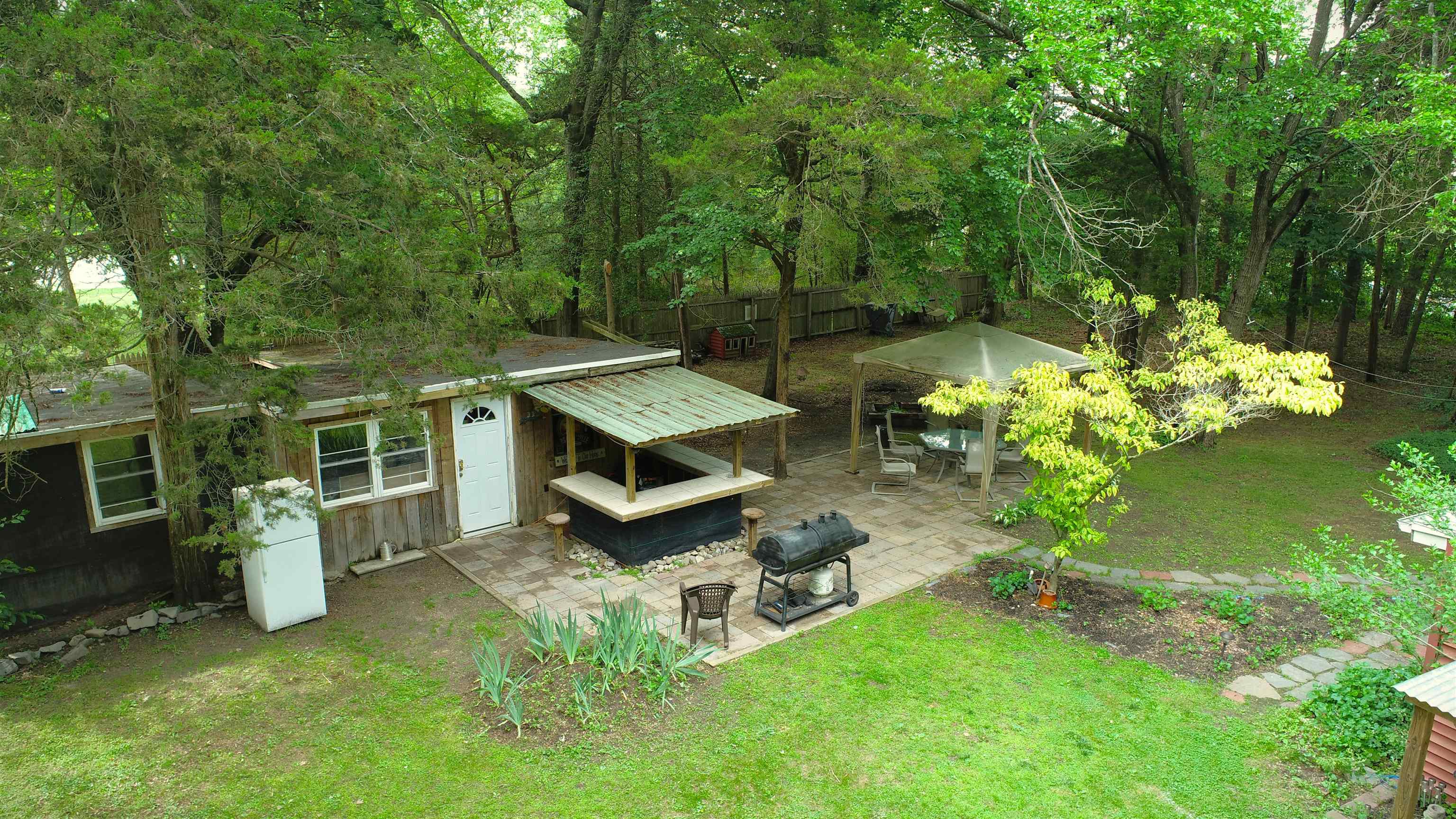 104 Head Of River Road Corbin City, NJ 08270 - Photo 6 of 50 a view of a house with backyard and garden