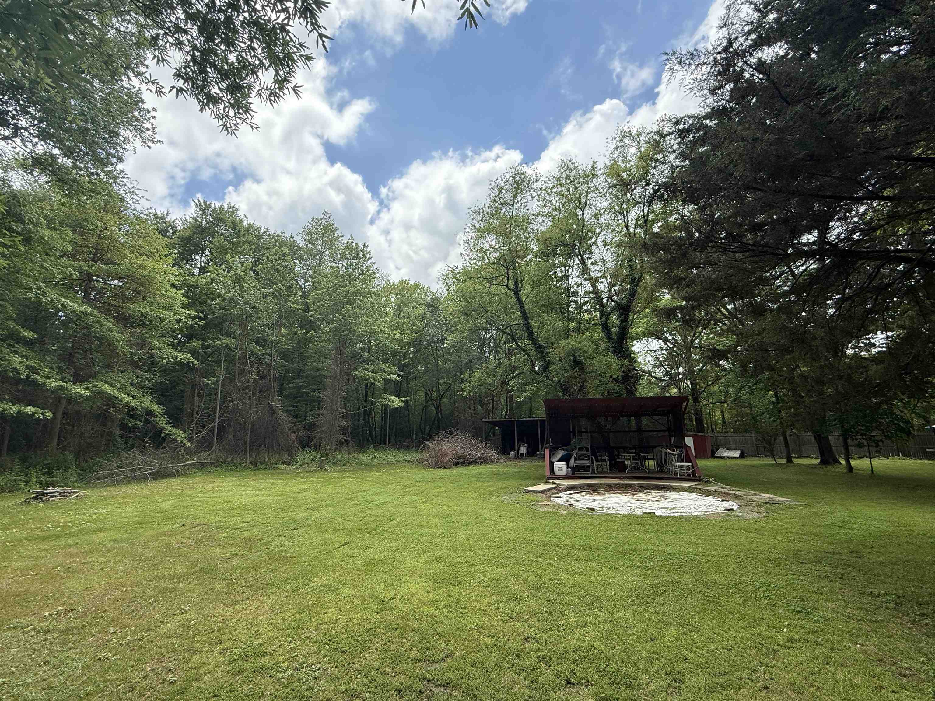 104 Head Of River Road Corbin City, NJ 08270 - Photo 7 of 50 a swimming pool with outdoor seating and yard