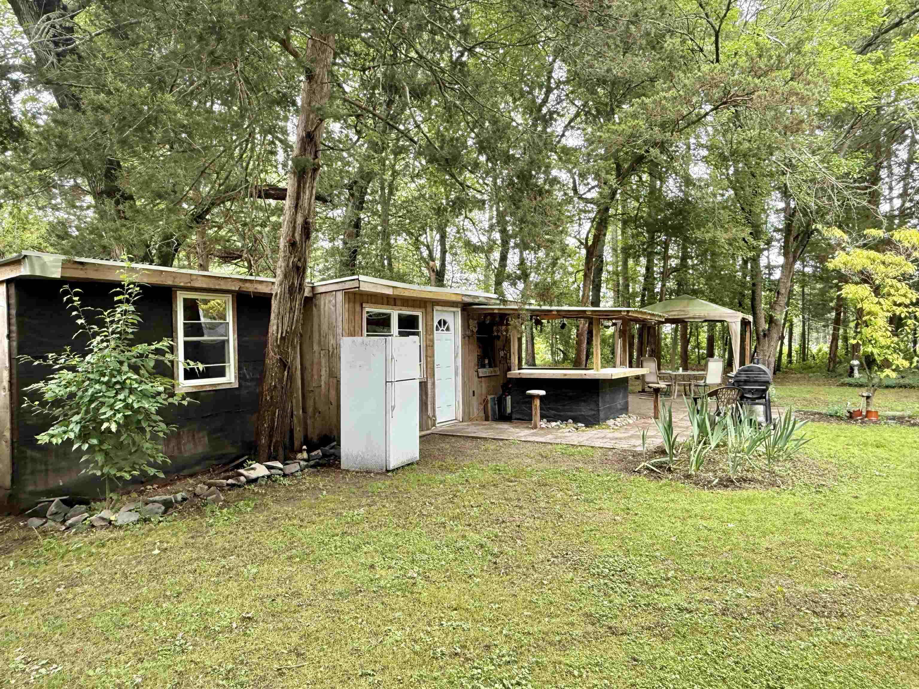 104 Head Of River Road Corbin City, NJ 08270 - Photo 8 of 50 a view of house with outdoor seating