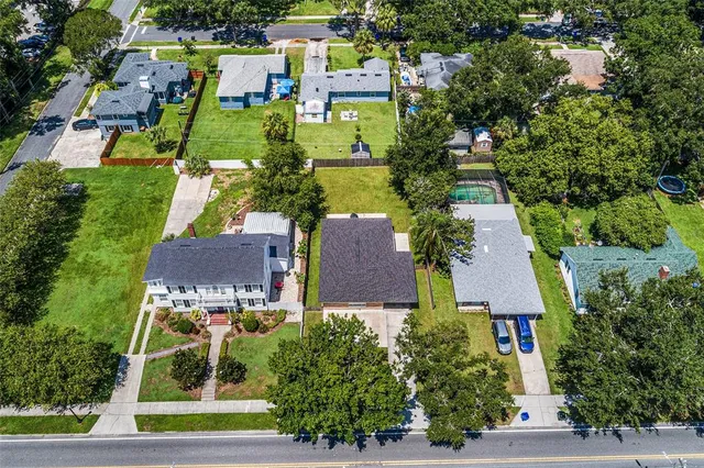 an aerial view of a house with a garden