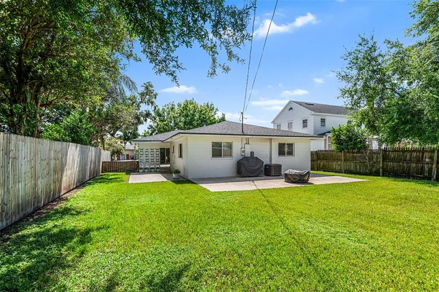 a front view of house with yard and seating area