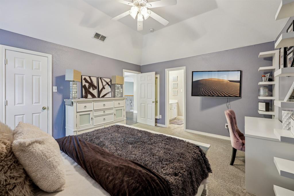 5603 Blazing Star Road Frisco, TX 75036 - Photo 28 of 39 a bedroom with a bed and furniture