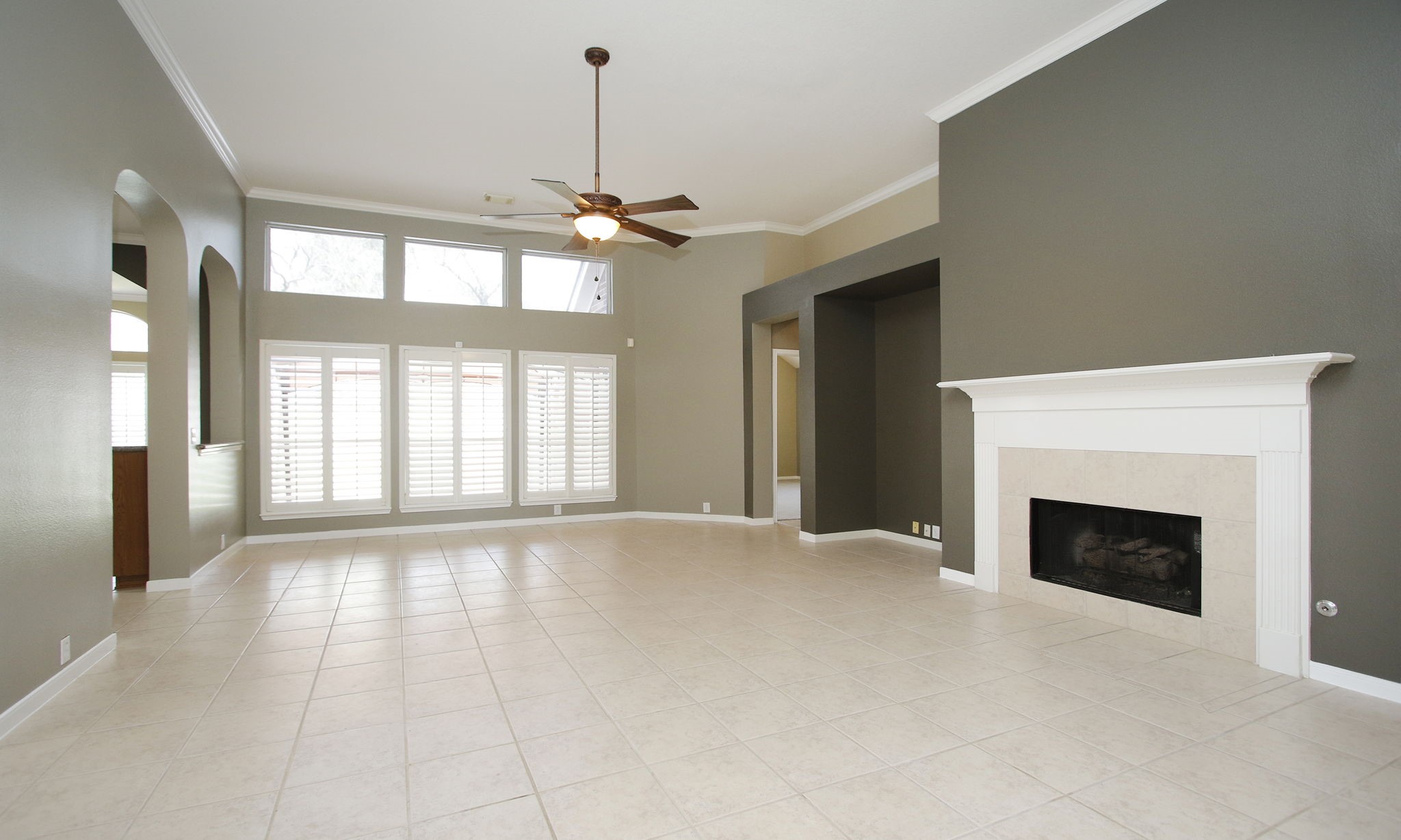 2802 Parkeston Drive Spring, TX 77388 - Photo 11 of 49 a view of an empty room with a fireplace and a window