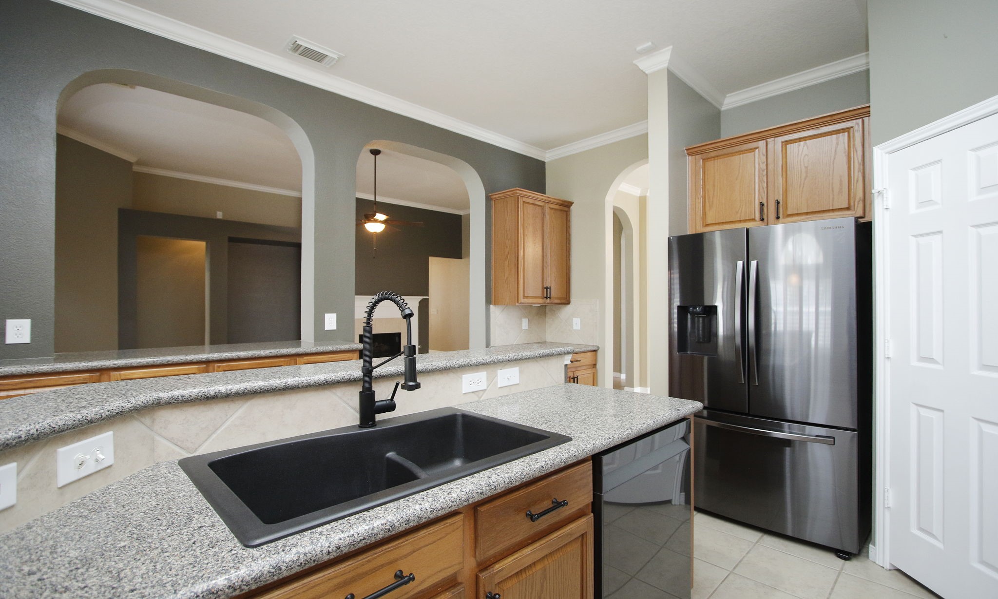 2802 Parkeston Drive Spring, TX 77388 - Photo 19 of 49 a kitchen with stainless steel appliances a sink and a refrigerator