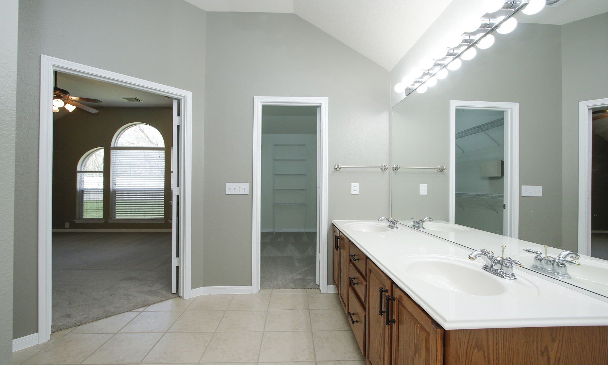 2802 Parkeston Drive Spring, TX 77388 - Photo 28 of 49 a spacious bathroom with a double vanity sink and a mirror