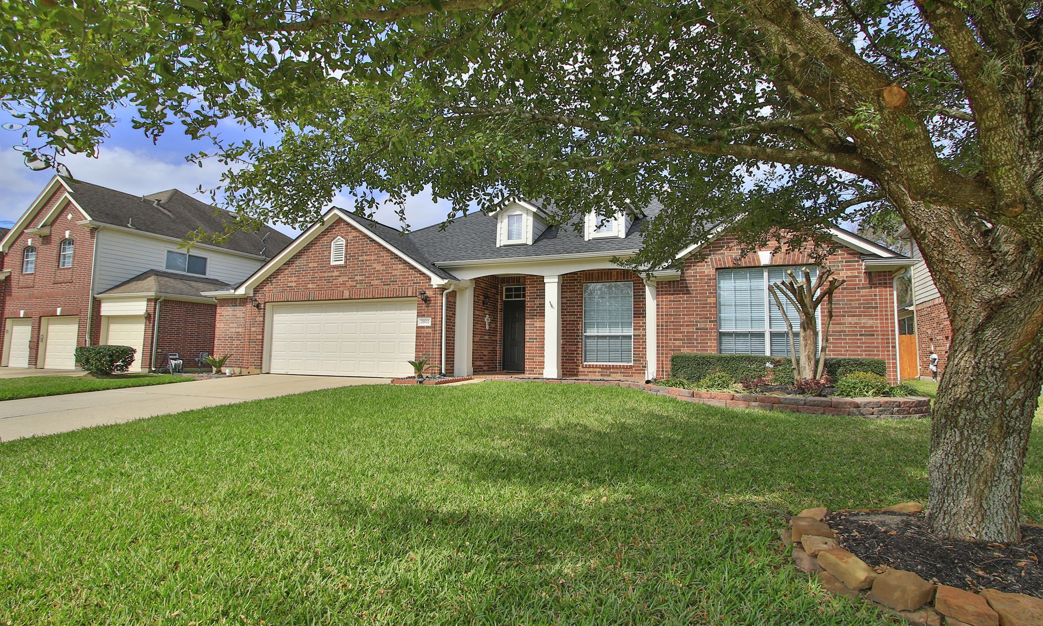 2802 Parkeston Drive Spring, TX 77388 - Photo 3 of 49 a front view of a house with a yard