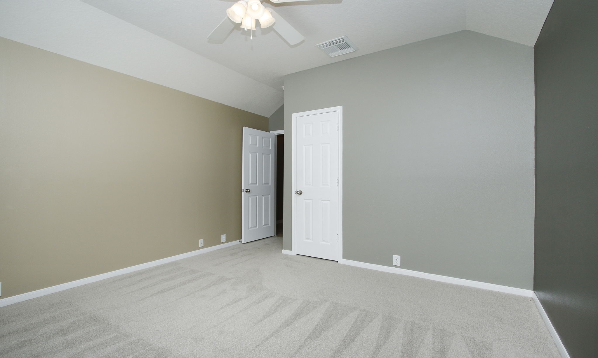 2802 Parkeston Drive Spring, TX 77388 - Photo 37 of 49 a view of an empty room with a chandelier fan