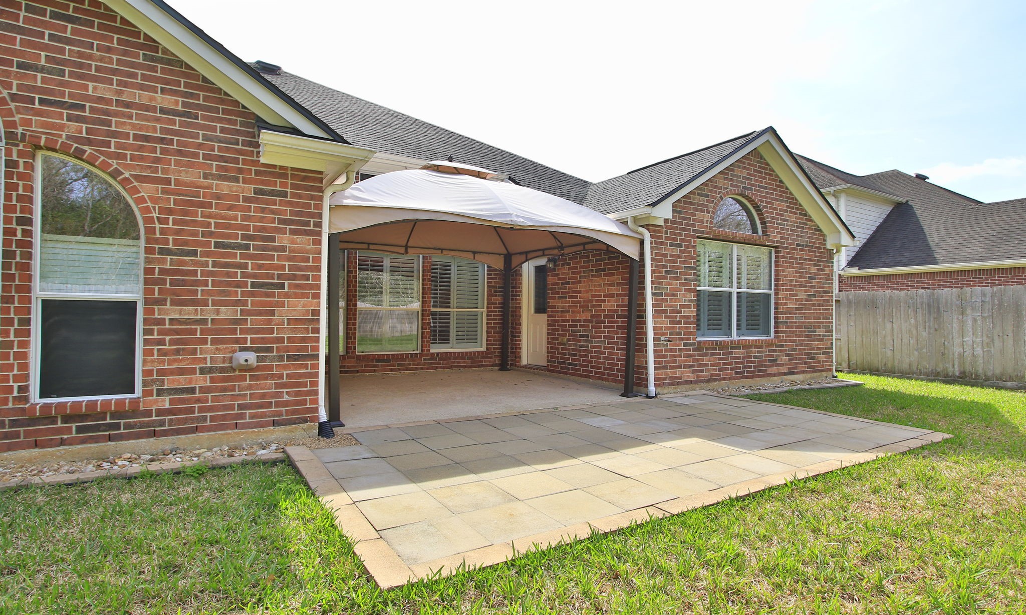 2802 Parkeston Drive Spring, TX 77388 - Photo 40 of 49 a view of a brick house with a yard