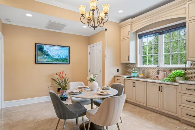 a view of a dining room with furniture window and outside view