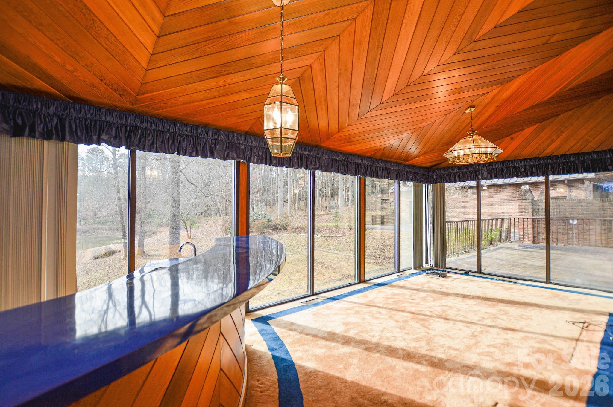 6910 State Highway 49 Mount Pleasant, NC 28124 - Photo 8 of 26 a bed sitting in a bedroom next to a window