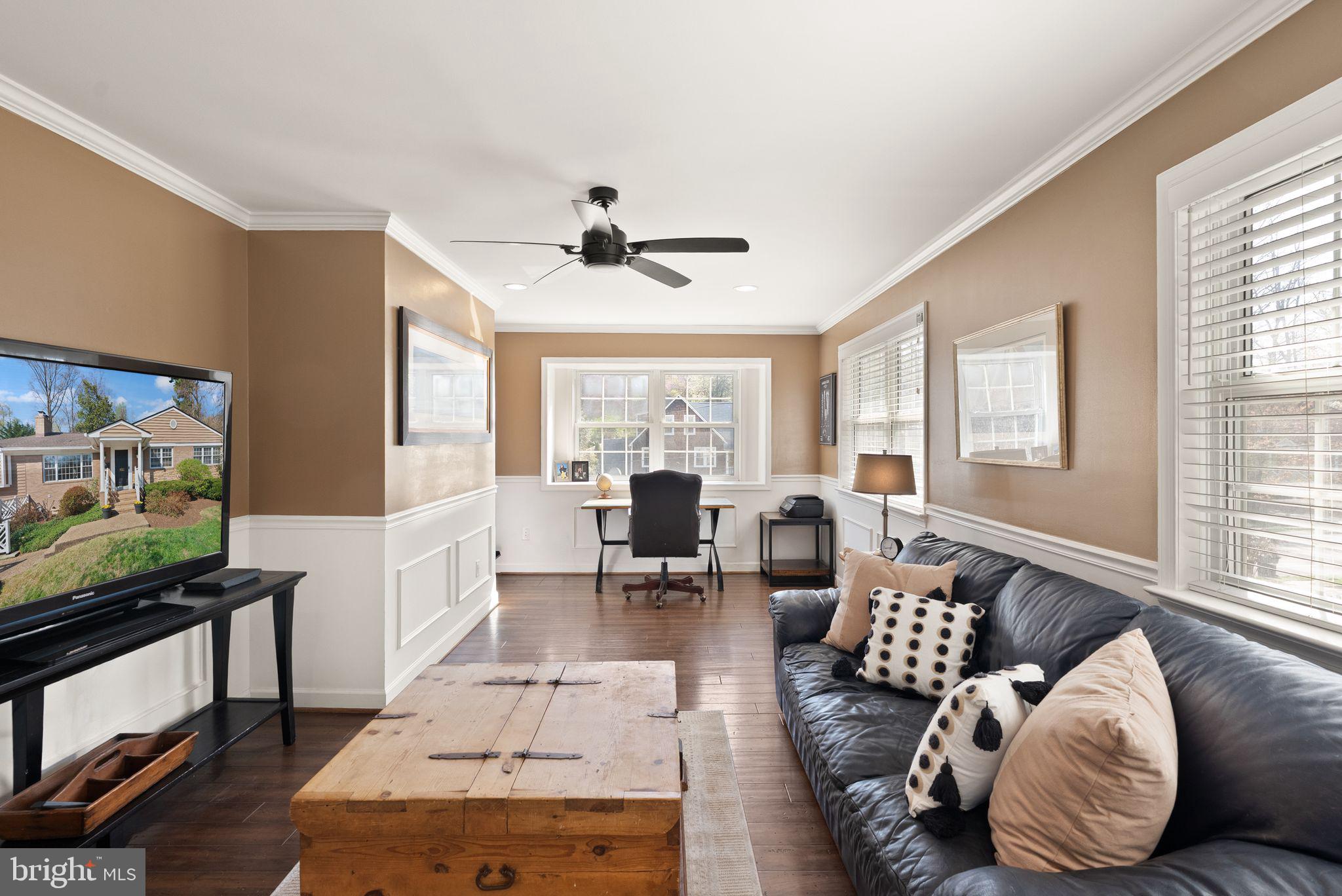 3012 Russell Road Alexandria, VA 22305 - Photo 17 of 56 a living room with furniture and a large window