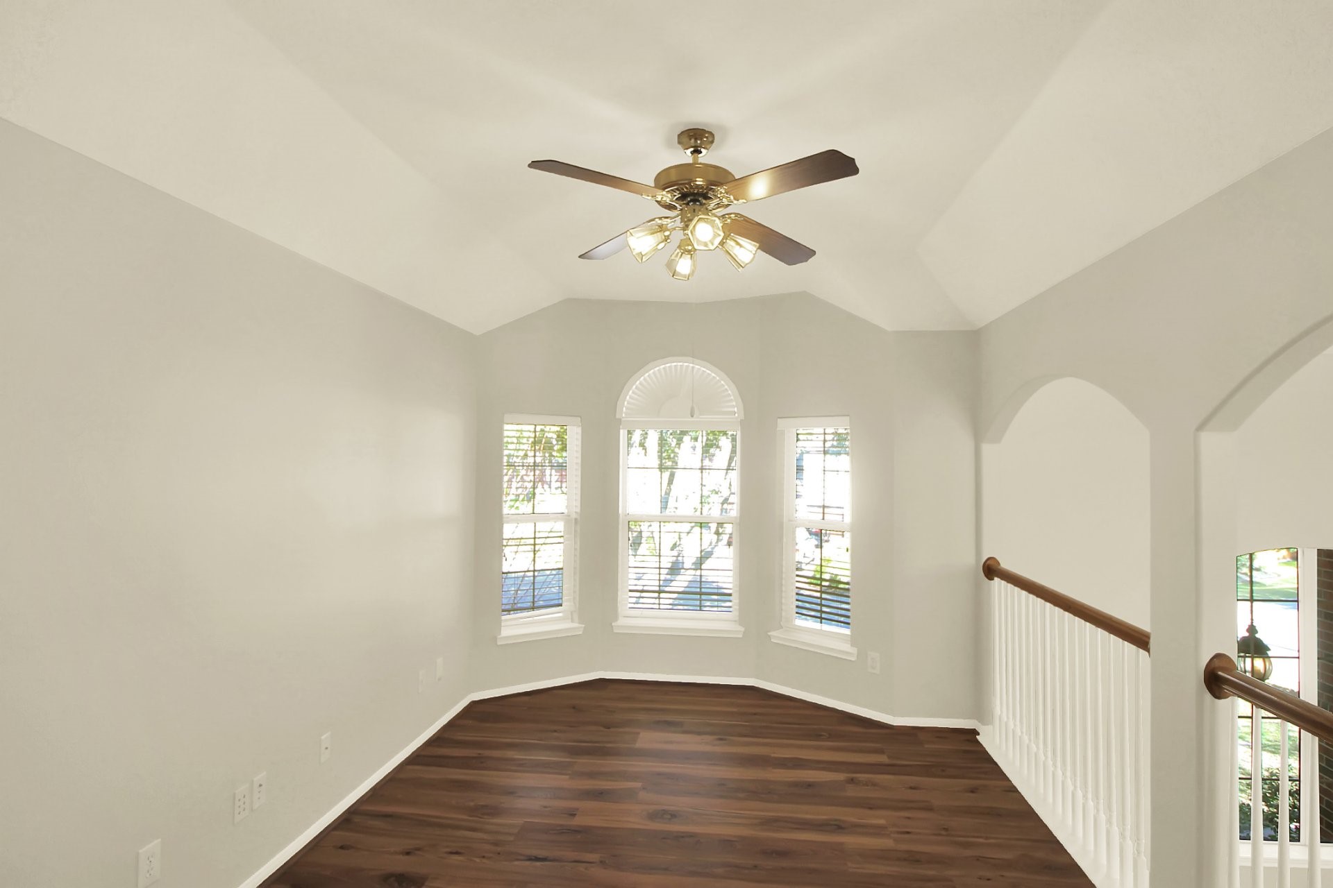 601 Forest Bend Lane Friendswood, TX 77546 - Photo 16 of 27 a view of an empty room with window and wooden floor