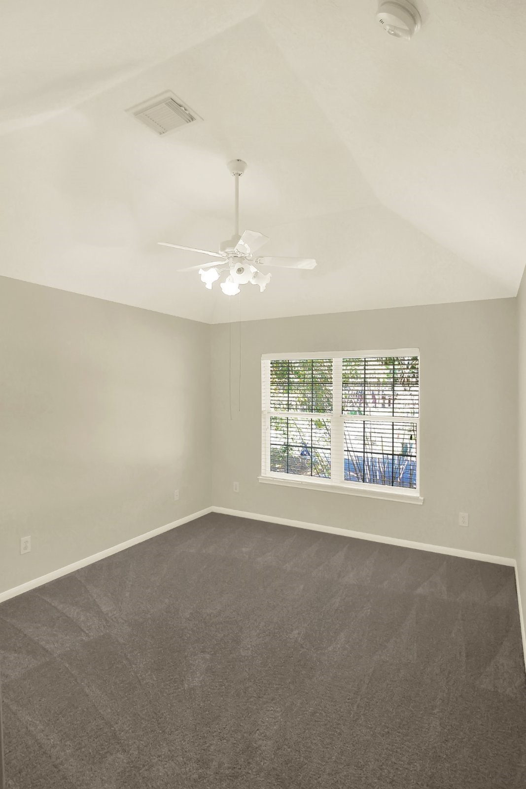601 Forest Bend Lane Friendswood, TX 77546 - Photo 17 of 27 an empty room with a empty space and windows