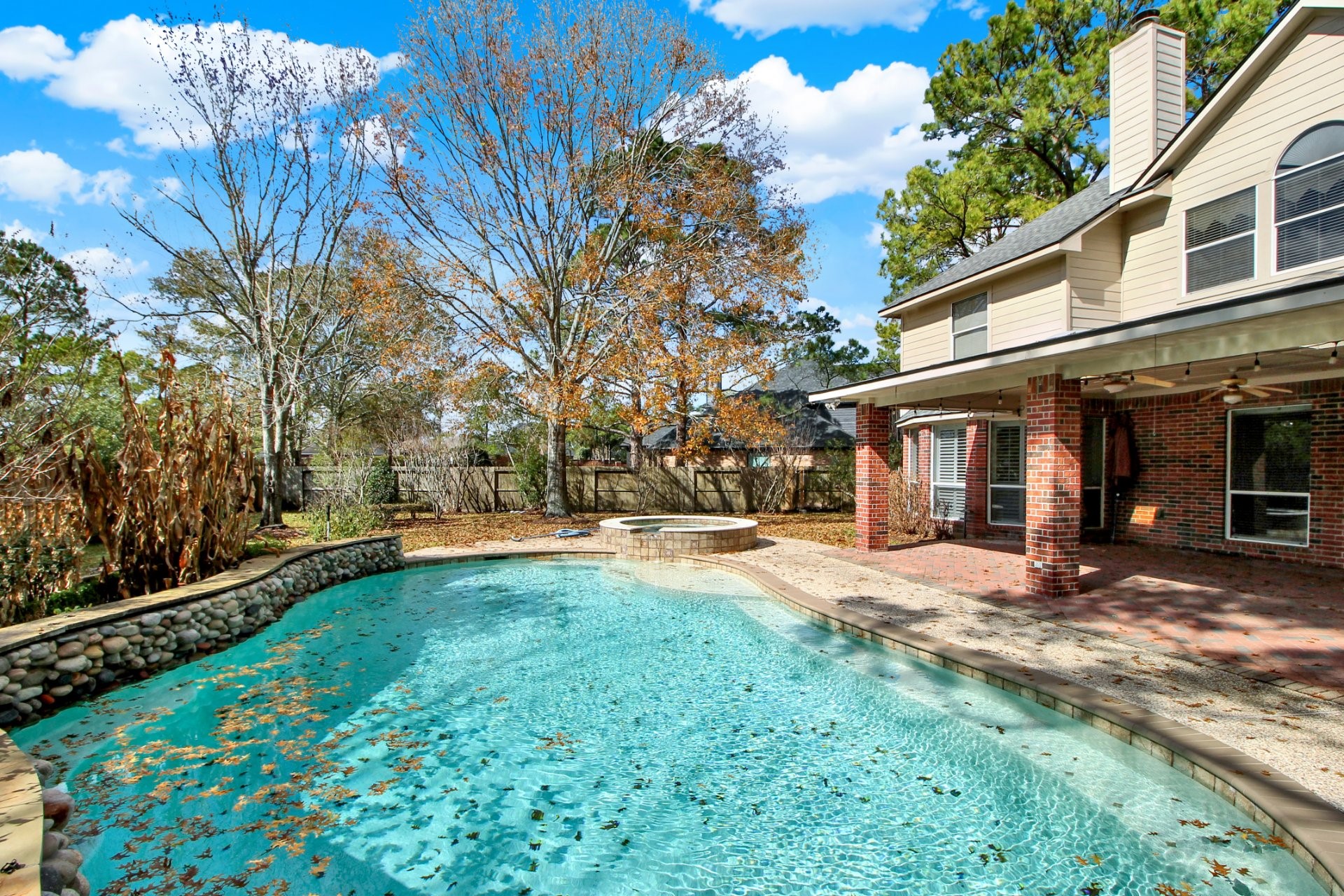601 Forest Bend Lane Friendswood, TX 77546 - Photo 27 of 27 a view of a house with backyard and sitting area