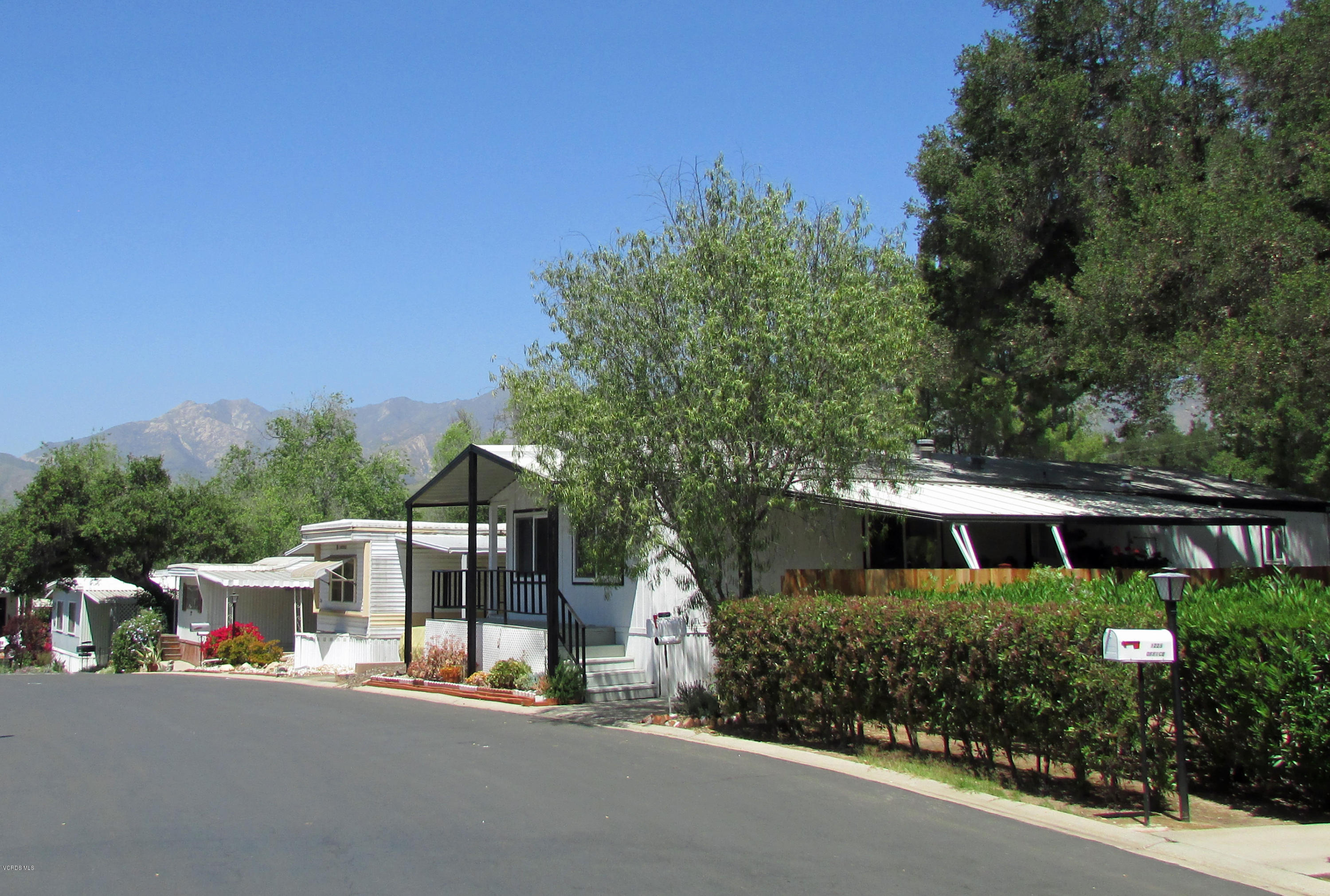 1225 South Rice Road, Unit 25 Ojai, CA 93023 - Photo 1 of 35 a view of a house with sitting area and tree s
