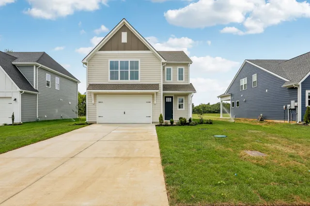 a view of a yard in front of a house