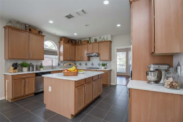 a view of an empty room and closet area