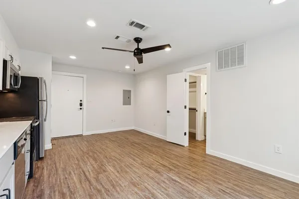 a view of a livingroom with a flat screen tv