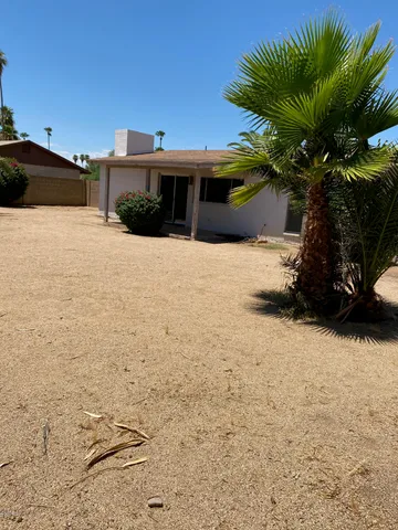 a picture of a house with a yard