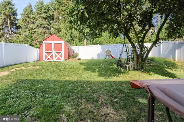 a view of backyard with green space