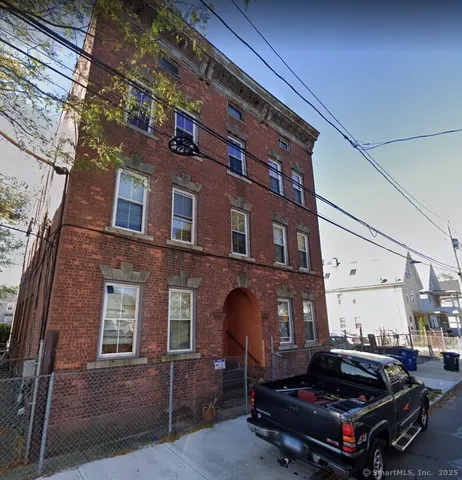 a car parked in front of a building