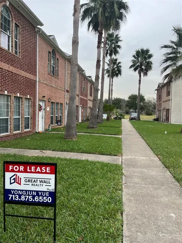 a sign on the side of building