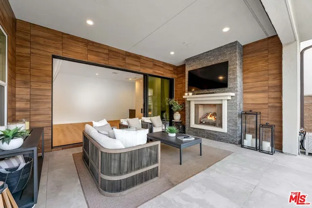 a view of a backyard with swimming pool